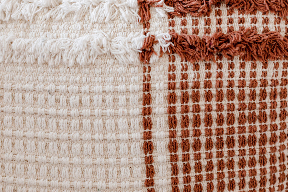 A closeup of the texture and colour of a pillow in our waiting area. 